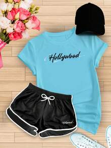 Conjunto Camiseta Algodão Estampada + Short Tactel Estampado Feminino Adulto Com Boné Liso - Azul bebê - Visão 1