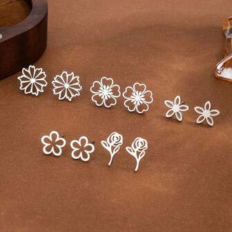 Un conjunto de 5 adorables pendientes mini de acero inoxidable con estilo colegial y diseño floral es perfecto para usar en sus atuendos diarios.