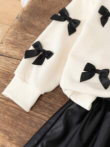 2 件女童休闲套装 - 领蝴蝶结卫衣 + 黑色 PU 裙子