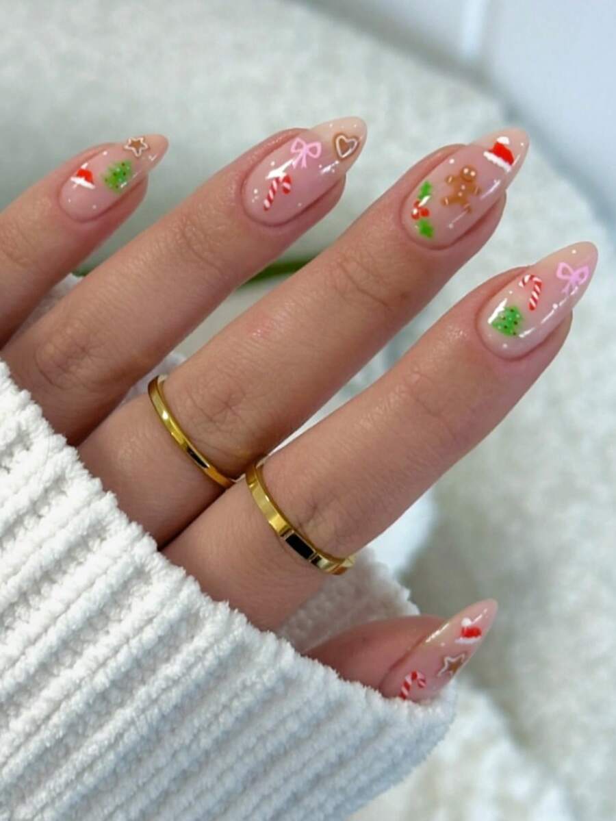 Bộ 24 miếng dán móng tay acrylic chủ đề Giáng sinh, bao gồm hình người bánh gừng, kẹo gậy, nơ, cây thông Noel, mũ ông già Noel và trái tim, kèm theo 1 lọ gel dẻo và 1 dũa móng. Hoàn hảo cho Giáng sinh, tiệc tùng, khiêu vũ và sử dụng hàng ngày, lý tưởng cho nghệ thuật làm móng mùa thu/đông.