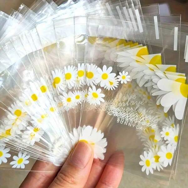 50/100 Sacs-cadeaux à imprimé marguerite, sacs d'emballage transparents autoadhésifs, idéaux pour les faveurs de mariage, les goûters d'anniversaire, l'emballage de petits cadeaux pour toute l'année, la cuisson de biscuits, les portions individuelles parfaites pour Noël, Halloween et la veille de Noël