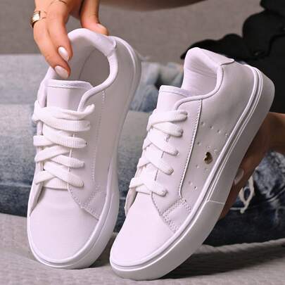 TENIS CASUAL FEMININO PLATAFORMA CORAÇAO  Simples    Desportivo    Amarrar  Ilhó    Casa