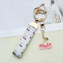 1 mặt dây chuyền hình nơ lụa in hình quả anh đào bằng tia UV, với mặt dây chuyền hình quả anh đào đáng yêu. Có thể treo trên chìa khóa cửa, túi xách, nhẹ và thời trang, hoàn hảo cho nữ chủ xe! - Nhiều màu - Xem 11