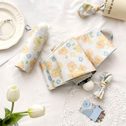 1pc 6-Rib Compact Folding Umbrella, UV Protection Sun Umbrella, Lightweight & Windproof, Suitable For Spring, Summer, Autumn & Winter, Convenient Foldable Parasol For Women, Minimalist Design, Outdoor Sun Shade, Reversible Black Coating & Floral Print, Dual Use Umbrella