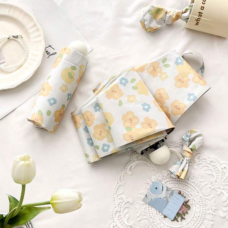 1pc 6-Rib Compact Folding Umbrella, UV Protection Sun Umbrella, Lightweight & Windproof, Suitable For Spring, Summer, Autumn & Winter, Convenient Foldable Parasol For Women, Minimalist Design, Outdoor Sun Shade, Reversible Black Coating & Floral Print, Dual Use Umbrella,Spring Summer Picks,Brides Maid Gifts,Room,Bedroom Decor,Beach,Travel,For Men,For Women,Vacation,Cute Stuff - Small Yellow Flower 50% Off - View 1