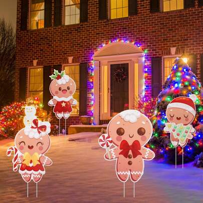 Conjunto de 4 peças de decoração de jardim em formato de biscoito de gengibre natalino, plástico durável, tema Papai Noel, 8 estacas de plástico, montagem, sem necessidade de energia, decoração de jardim, passarela e varanda para festas