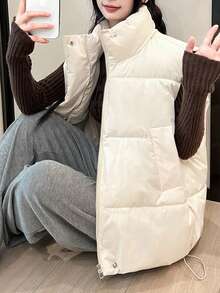 Chaleco de algodón con relleno de plumón para mujer - Nuevo estilo para primavera/otoño Chaleco sin mangas de corte holgado inspirado en Corea con cuello alto Chaleco sin mangas de algodón de color liso Chaleco exterior para mujer Cazadoras para Mujer Abrigos de Invierno para Mujer - Blanco - Ver 4