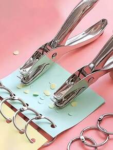 坚固耐用的金属手持式打孔器：直径 6 毫米圆形，盒装，办公专用。操作简便，是家庭办公室、学校、工作场所的理想之选。非常适合上班族、学生、教师、行政人员和手工爱好者。