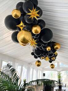 121 pièces/set Kit d'arche de guirlande de ballons noirs et dorés, ballons confettis noirs et dorés avec étoiles, pour la décoration de fête du Nouvel An, d'anniversaire, de mariage