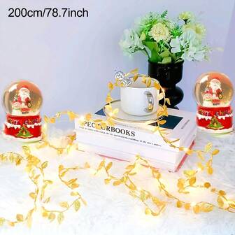 1 pieza Guirnalda de luces con hojas de oro alimentadas por batería, luces LED de corona de flores de lámina, adecuadas para la decoración del árbol de Navidad - Adecuadas para dormitorio, sala de estar, oficina, boda, Navidad y decoración de fiestas | Luz amarilla cálida y ambiente acogedor, decoración de boda, iluminación navideña, iluminación elegante, iluminación decorativa, diseño ligero, plástico, iluminación ambiental, decoración del hogar, decoración navideña XMAS Decoración del árbol de Navidad Regalo de decoración Decoración de Acción de Gracias Boda Decoración del hogar Decoración de otoño Decoración de otoño Decoraciones de cumpleaños para regalos Suministros para fiestas Decoración interior y exterior Jardín Decoración de festivales Decoración de Halloween Decoración de pared Adornos de Halloween