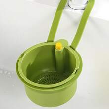 Over-The-Sink Hanging Basket. Residue-Filtering Mesh. Adjustable Hanging Feature. Debris Collection Bucket. Space-Saving Drain Basket. Single-Button Drainage And Independent Filtration System. Easy-To-Clean Sink Organizer For Kitchen And Bathroom. Durable Plastic Construction. Kitchen Sink Basket. Food Waste Disposal. Compact Design. Sturdy Structure. Ideal For Home Cooks.