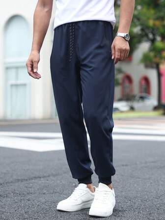 Pantaloni casual sportivi da uomo traspiranti e ad asciugatura rapida, pantaloni da esterno comodi e versatili, adatti per l'estate