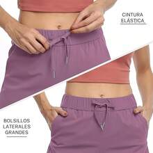 GOMITA Short Deportivo Mujer,Yoga Mujer Short,Pantalones Cortos de Running con Bolsillos para Yoga,Running,Gimnasia,Casual y Entrenamiento - Morado - Ver 5