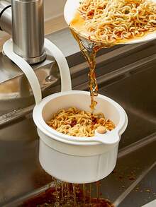 Over-The-Sink Hanging Basket. Residue-Filtering Mesh. Adjustable Hanging Feature. Debris Collection Bucket. Space-Saving Drain Basket. Single-Button Drainage And Independent Filtration System. Easy-To-Clean Sink Organizer For Kitchen And Bathroom. Durable Plastic Construction. Kitchen Sink Basket. Food Waste Disposal. Compact Design. Sturdy Structure. Ideal For Home Cooks.