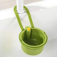 Over-The-Sink Hanging Basket. Residue-Filtering Mesh. Adjustable Hanging Feature. Debris Collection Bucket. Space-Saving Drain Basket. Single-Button Drainage And Independent Filtration System. Easy-To-Clean Sink Organizer For Kitchen And Bathroom. Durable Plastic Construction. Kitchen Sink Basket. Food Waste Disposal. Compact Design. Sturdy Structure. Ideal For Home Cooks.