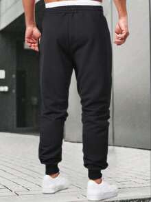 1 pièce Pantalon de survêtement en molleton unicolore décontracté pour adolescents garçons, avec poignets élastiques, printemps/automne