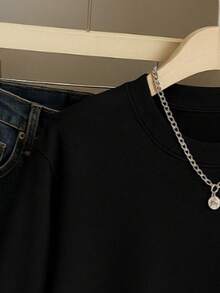 Sudadera lisa unisex de manga larga con cuello redondo y puños ajustados, estilo cárdigan. Ideal para looks casuales o de entretiempo. - Negro - Ver 3