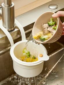 Over-The-Sink Hanging Basket. Residue-Filtering Mesh. Adjustable Hanging Feature. Debris Collection Bucket. Space-Saving Drain Basket. Single-Button Drainage And Independent Filtration System. Easy-To-Clean Sink Organizer For Kitchen And Bathroom. Durable Plastic Construction. Kitchen Sink Basket. Food Waste Disposal. Compact Design. Sturdy Structure. Ideal For Home Cooks.