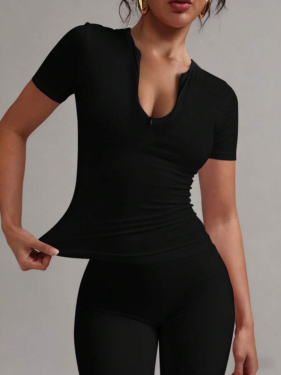 XLLAIS Women's Fashionable Zip Collar Solid Color Tight Fit T-Shirt, Stretchy Short Sleeve Casual Sports Top, Back To School Season - Black - View 1