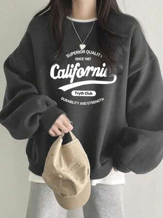 女士休闲宽松卡通字母印花圆领运动衫，百搭秋冬