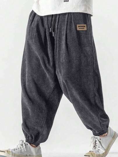 男士字母印花灯芯绒休闲宽松九分保暖裤，时尚街头服饰，秋冬