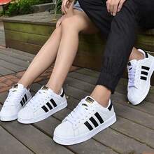 Adidas Zapatillas deportivas de caña baja con puntera de concha, unisex - Blanco - Ver 1