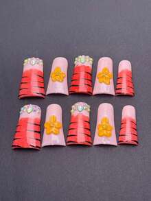 10 uñas postizas con forma de pico de pato hechas a mano. Utiliza rayas naranjas de coral y negras para crear un patrón de tigre juguetón, con flores tridimensionales amarillas y piedras de imitación, y realza el esplendor a través de diamantes brillantes, lo que lo hace adecuado para un ambiente diario o festivo. - Multicolor - Ver 2