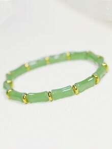 手工制作的中国风竹结手链，配以绿色人造水晶珠和金色隔珠 - 象征着丰收、繁荣和好运，适合女性日常佩戴或节日礼物（新年幸运符），竹手链，竹结设计，精致的串珠工艺，节日配饰，时尚珠宝，手工制作的外观