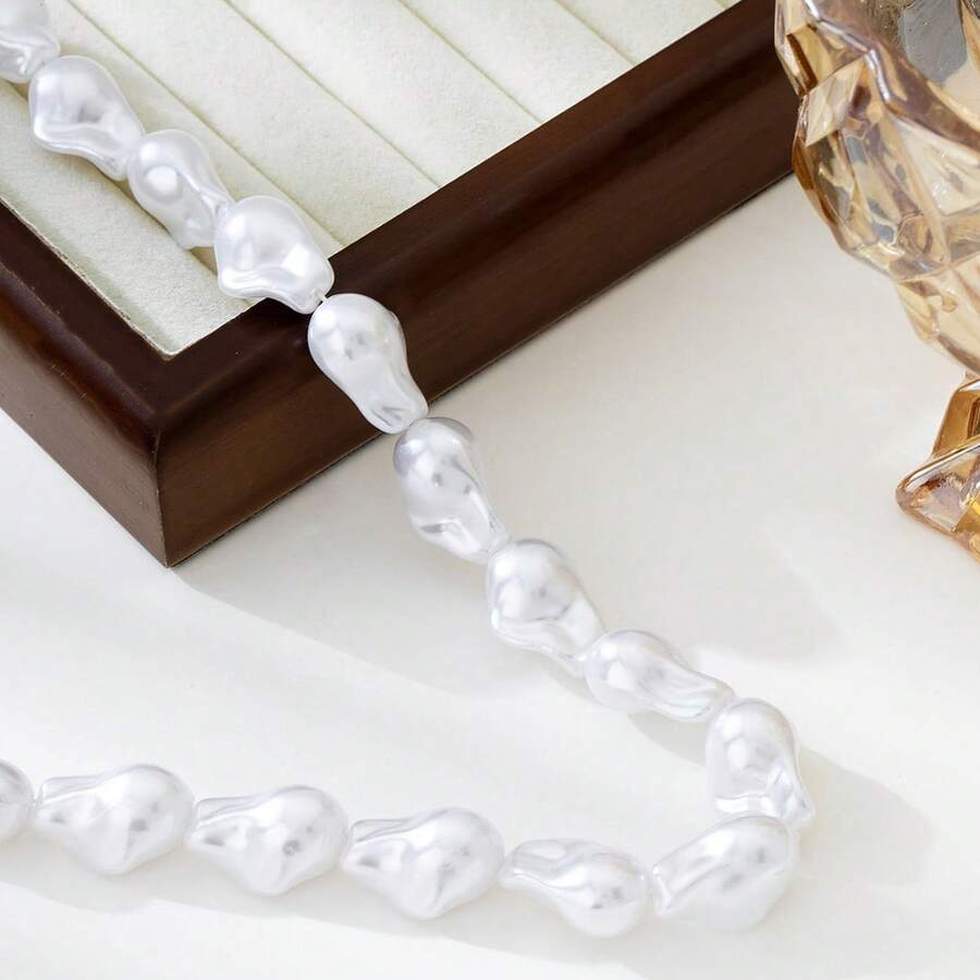 Collar largo asimétrico de lujo francés con perlas falsas, collar de perlas falsas barroco de alta gama para mujer, collar de perlas falsas versátil para mujer.
