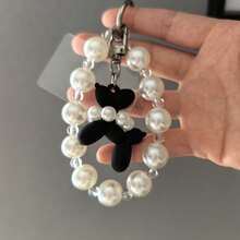 1 pièce Pendentif de chien en perle, décoration suspendue en chaîne de perles, porte-clés de chien en ballon de perle DIY, accessoire de chaîne de téléphone en perle plissée, décoration suspendue de téléphone à la mode pour dame, peut être utilisé comme caméra, sac, éventail à main, décoration de porte-clés compatible avec Android et la plupart des smartphones, cadeaux pour mère, famille, amis, enfants, anniversaire, vacances