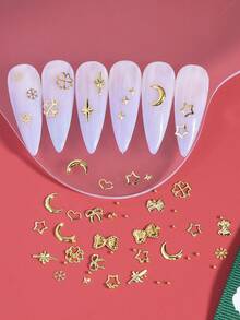 1 Box funkelnde goldene Stern Schleifen, Cut Out herzförmige Nieten Nail Art Accessoires, 3D Schneeflocke Stern Blume Mond Legierung Metall Nagel Zubehör, Maniküre Dekorationen, Nail Art Schmuck, Edelsteine