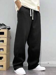 Men's Loose And Fashionable Sporty Long Pants, Featuring A Casual And Simple Solid Color Wide-Leg Design, With Drawstring At The Waist And Large Pockets, Suitable For Daily Strolls, Work, Travel, Etc