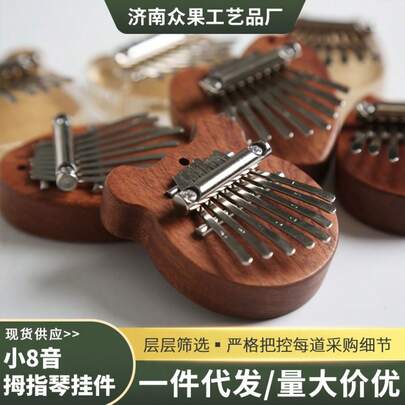 Kalimba à 8 touches avec cordon de suspension et partition