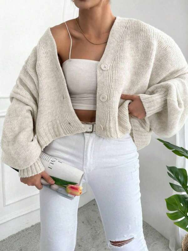 Casaco cardigan de malha com corte solto e manga curta/longa da moda 2025 para mulheres, versátil para primavera, outono e inverno