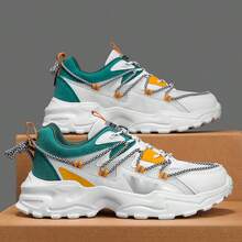 Zapatillas deportivas casuales con diseño de letra, suela gruesa y cordones delanteros para hombres. Zapatos deportivos casuales ligeros, versátiles y de moda para uso diario y running. Diseño de suela gruesa con efecto estilizante.