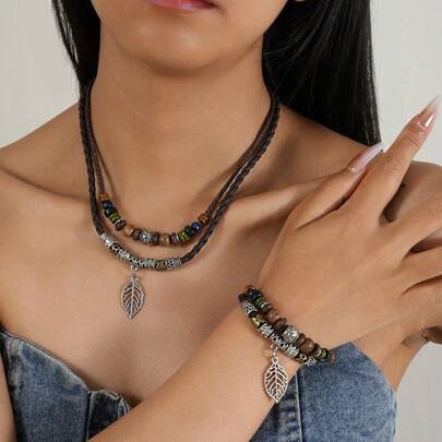 Vintage Blatt Anhänger Halskette Armband Boho Schmuckset - Boho Perlen Design, Holz- und Metallakzente, mehrschichtiges verstellbares Kunstlederband, Boho Chic Charm Herbst Schmuckgeschenk für Frauen und Männer, Freunde, Familie, lässiger Alltag, einzigartiges handgemachtes Hexen-Preppy-Accessoire