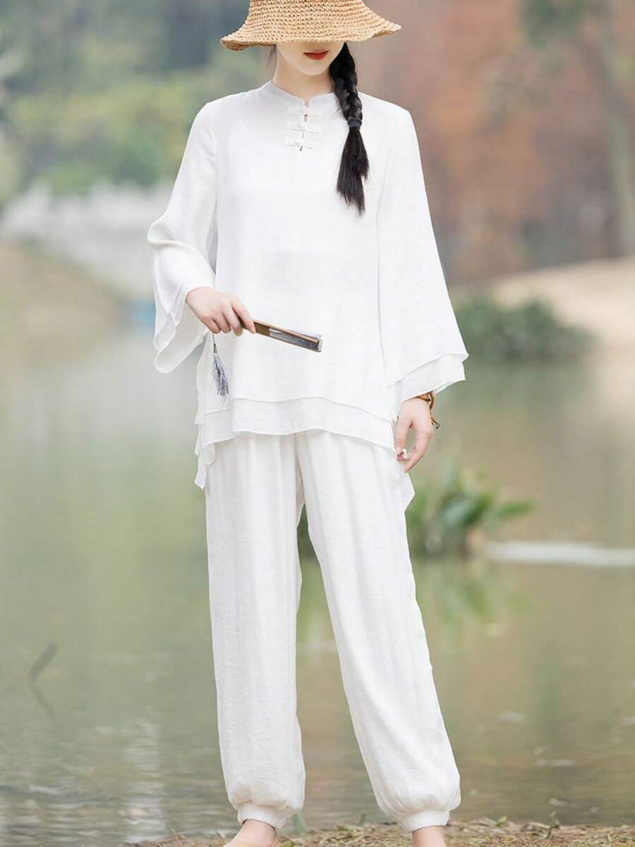 Bộ Hanfu trắng cải tiến 2 món dành cho nữ, kiểu dáng bất đối xứng Trung Quốc, áo tay loe cài cúc cổ điển bằng vải lanh và quần ống rộng thoải mái, thích hợp cho các buổi trà đạo mùa xuân/hè, yoga, thái cực quyền. - trắng - Xem 1