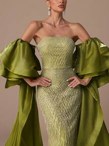 女士奢华无肩带美人鱼礼服，夸张的喇叭袖和亮片流苏细节，优雅精致的正式礼服，低背交叉绑带设计，搭配飘逸的披肩，适合正式晚宴、婚礼、盛会、慈善舞会，也是圣诞节期间女士们的理想优雅之选。 - 橄欖綠 - 查看 3