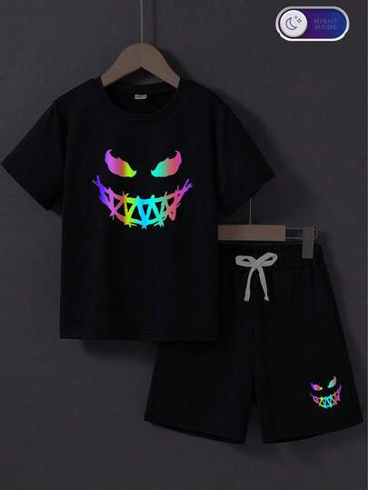 Set de 2 piezas de camiseta de manga corta y pantalones cortos deportivos informales con estampado de rostro abstracto que brilla en la oscuridad para niños preadolescentes, primavera/verano