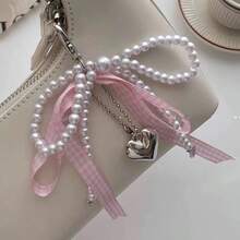 1 pieza Cuerda a dos tonos con perla blanca, temperamento elegante, dulce, de moda, exquisita e interesante, corazón de melocotón, corazón, corazón, corazón, mochila, bolso de hombro, bolso de hombro diagonal, bolso de mano, bolso de mano, colgante, llavero de coche, colgante de bicicleta, colgante de auriculares, colgante de bolsa de almacenamiento, colgante, adecuado para parejas, estudiantes, estudiantes escolares, niñas, trabajo, transporte, citas diarias, vacaciones, viajes y viajes de negocios, adecuado para niños, vacaciones, novias, madres, regalos pequeños, regalos de cumpleaños