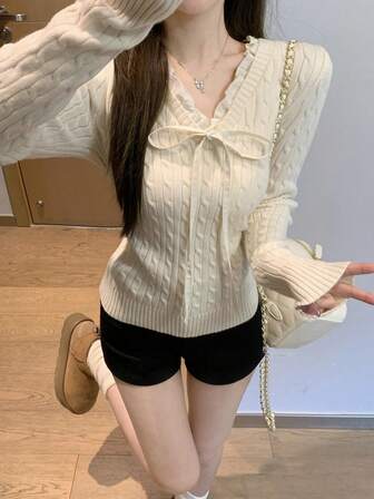 V领拼布学院风活力麻花针织毛衣，秋冬