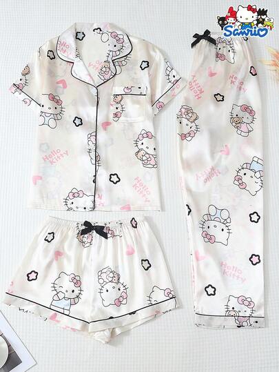 Sanrio Conjunto de 3 piezas de pijama para mujer, con blusa de manga corta con bolsillo y cuello de Hello Kitty, y pantalones/shorts con moño, ropa casual para estar en casa en otoño e invierno
