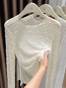 Camiseta de malla de playa de unicolor, blusa transparente con aplicación de encaje de manga larga elegante para mujer, otoño 2025