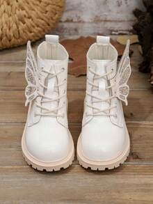 1 par de botas blancas para bebés/niños pequeños, de material PU suave y brillante, con cremallera metálica, decoración de alas con lazo y strass, punta redonda, suela gruesa antideslizante y cómoda, de media pantorrilla, adecuadas para niñas estudiantes, uso casual diario, viajes, escuela, otoño/invierno