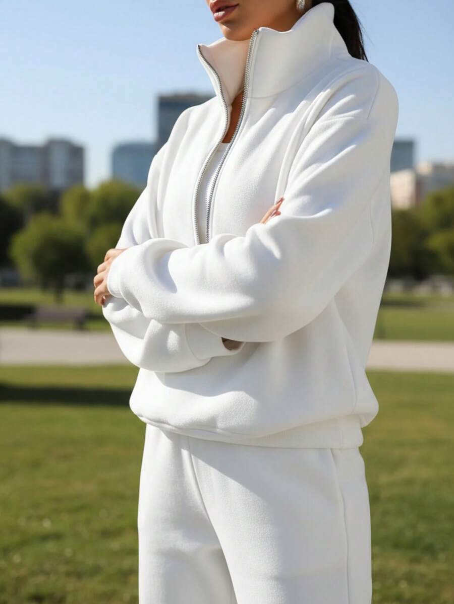 Women's Two-Piece Set Sweatshirt Fleece Sports Street Casual Fashion Outfit For Women. Made With Soft Fleece Fabric And A Half-Zip High Neck Design, This Set Of Two Sweatshirts And Jogger Pants Offers A Perfect Balance Of Warmth And Comfort With A Sweet And Relaxed Vibe. It's A Chic And Effortless Essential For Autumn And Winter, Ideal For Lounging At Home Or Going Out Casually. - 白色 - 查看 1