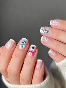 立即升级您的外观，24 件短方形按压式圣诞假指甲优雅可爱企鹅雪人蓝色和粉色围巾白色指甲时尚白色法式白色雪花假指甲全覆盖假指甲套装适合女性和女孩，包括美甲沙龙，1 块果冻凝胶和 1 个锉刀 Stri 果冻凝胶随机发货 - 白色 - 查看 1