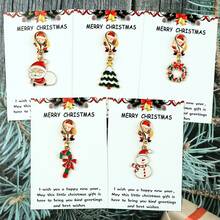 5个圣诞钥匙扣，包含圣诞老人、圣诞树、花环、拐杖糖、雪人等经典圣诞元素。卡片上印有“圣诞快乐”字样以及祝福语“祝您新年快乐，愿这份小小的圣诞礼物为您带来美好的问候和祝福”，适合作为圣诞节和新年礼物，传递节日祝福。也可作为包包挂饰、汽车饰品、教师礼物、朋友礼物或姐妹礼物。 - 彩色 - 查看 1