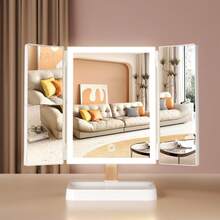 1个三折LED化妆镜，3倍/2倍/1倍放大倍率，便携式高清化妆镜，亮度可调，可折叠设计，带支架和三色灯光，内置1800mAh可充电电池，USB充电，方便旅行携带，带触摸屏调光功能，是送给女性的最佳礼物，情人节礼物，圣诞节礼物。