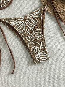 Women's Embroidered Crochet Bikini Set Featuring Underwire Bra And Side Tie Bottoms For A Chic Beach Look