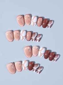 24 de unghii acrilice franceze scurte, ovale, maro, model presat, potrivire perfectă, setul include: 1 gel jeleu și 1 pilă de unghii. Autocolantele maro pentru unghii fac vârfurile degetelor să strălucească frumos, potrivite pentru petreceri, dans și uz zilnic.